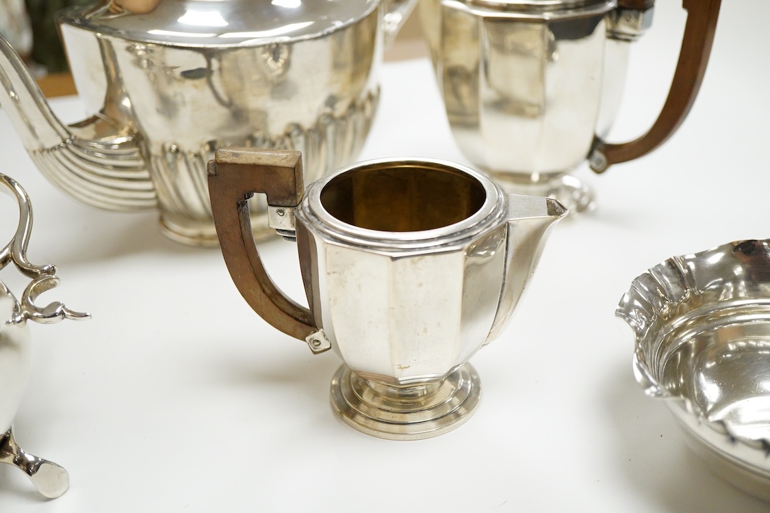 A 20th century continental 800 standard white metal hot water pot and cream jug (lacking cover and knop), gross weight 11.2oz, together with a plated teapot, sauceboat and bowl.